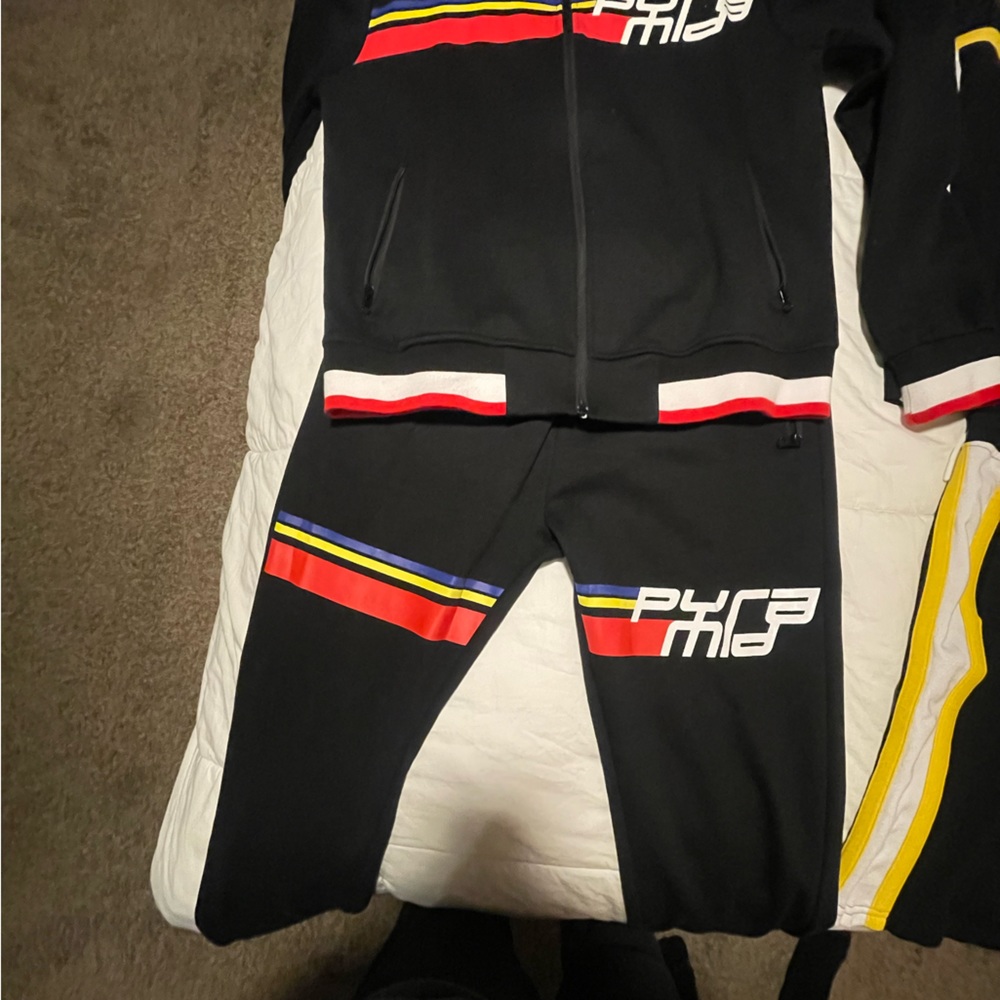 Black pyramid track suit